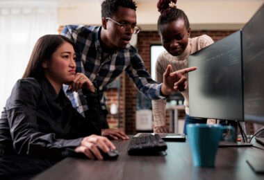 African american team leader pointing out unknown anomalies