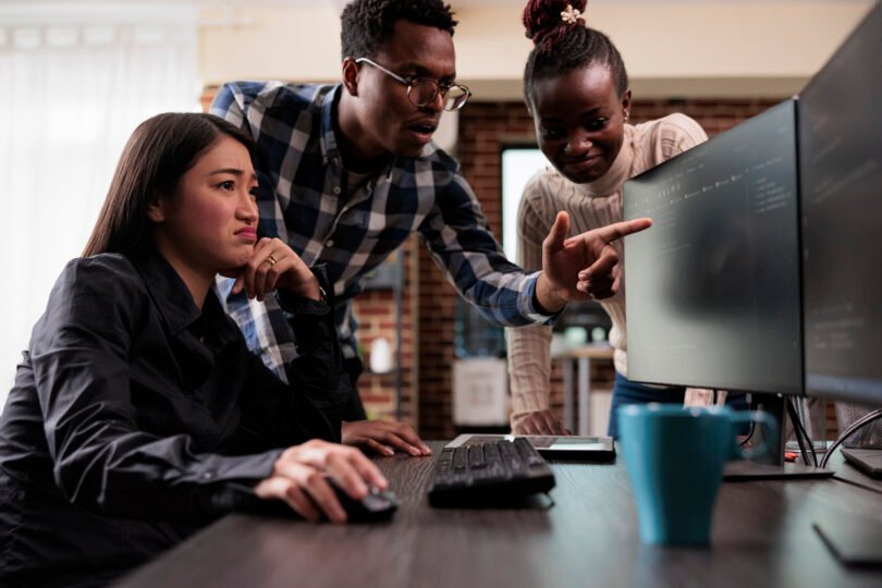 African american team leader pointing out unknown anomalies